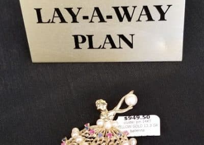 Layaway sign with pendant
